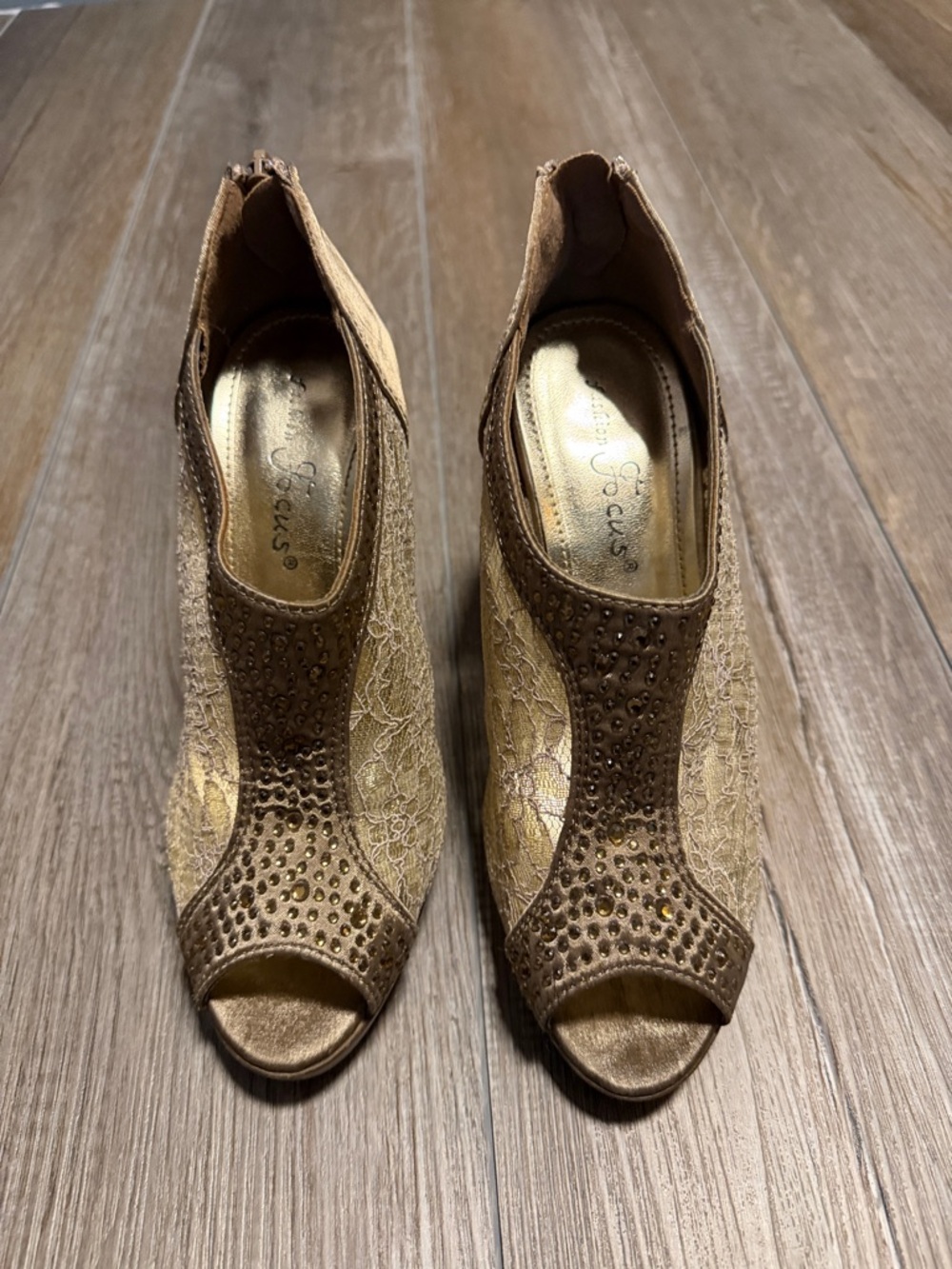 Fashion Focus feature intricate lace detailing and rhinestone